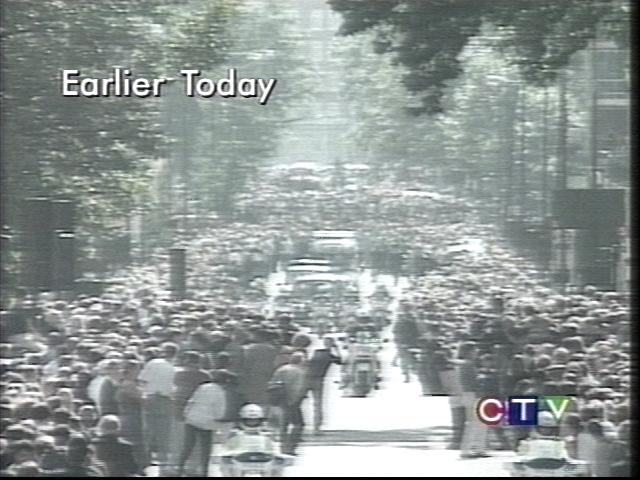 crowds watching her funeral